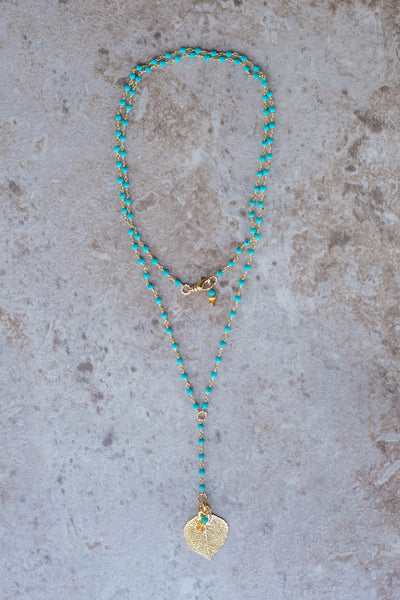 Gold leaf & Turquoise long Y style necklace.
