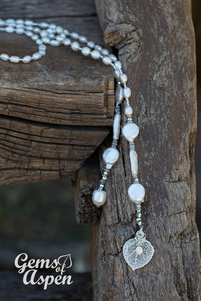 Lariat: White Freshwater & coin pearls created  with silver crystals and a silver  Aspen leaf