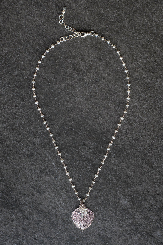 Pearls in silver chain:White pearls accent the classic princess style necklace with a Silver Aspen leaf