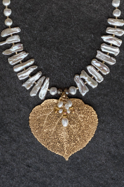 White freshwater stick pearls:  Dramatic choker necklace highlighting the Gold Aspen leaf and pearl /crystal dangles