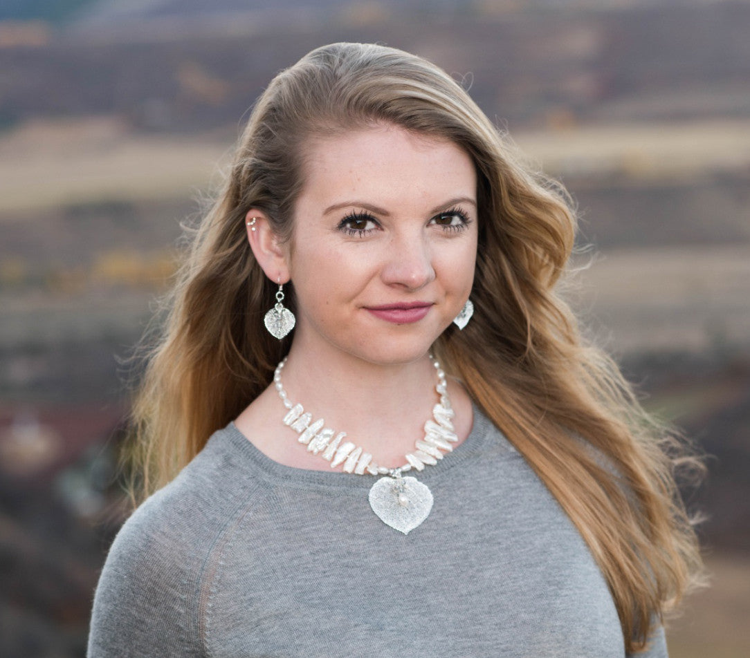 White freshwater stick pearls:  Dramatic choker necklace highlighting the silver Aspen leaf and pearl /crystal dangles