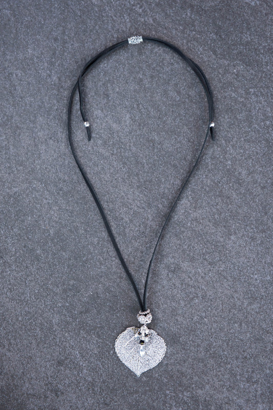 Single Aspen leaf, black deerskin leather, embellished with a crystal-studded bead and crystal dangles