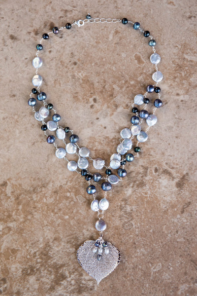 Silver coin pearl mixed with peacock pearls
